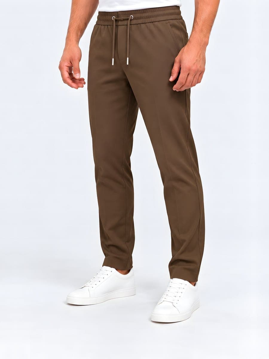 Polyester straight leg drawstring trousers in brown, angled front view