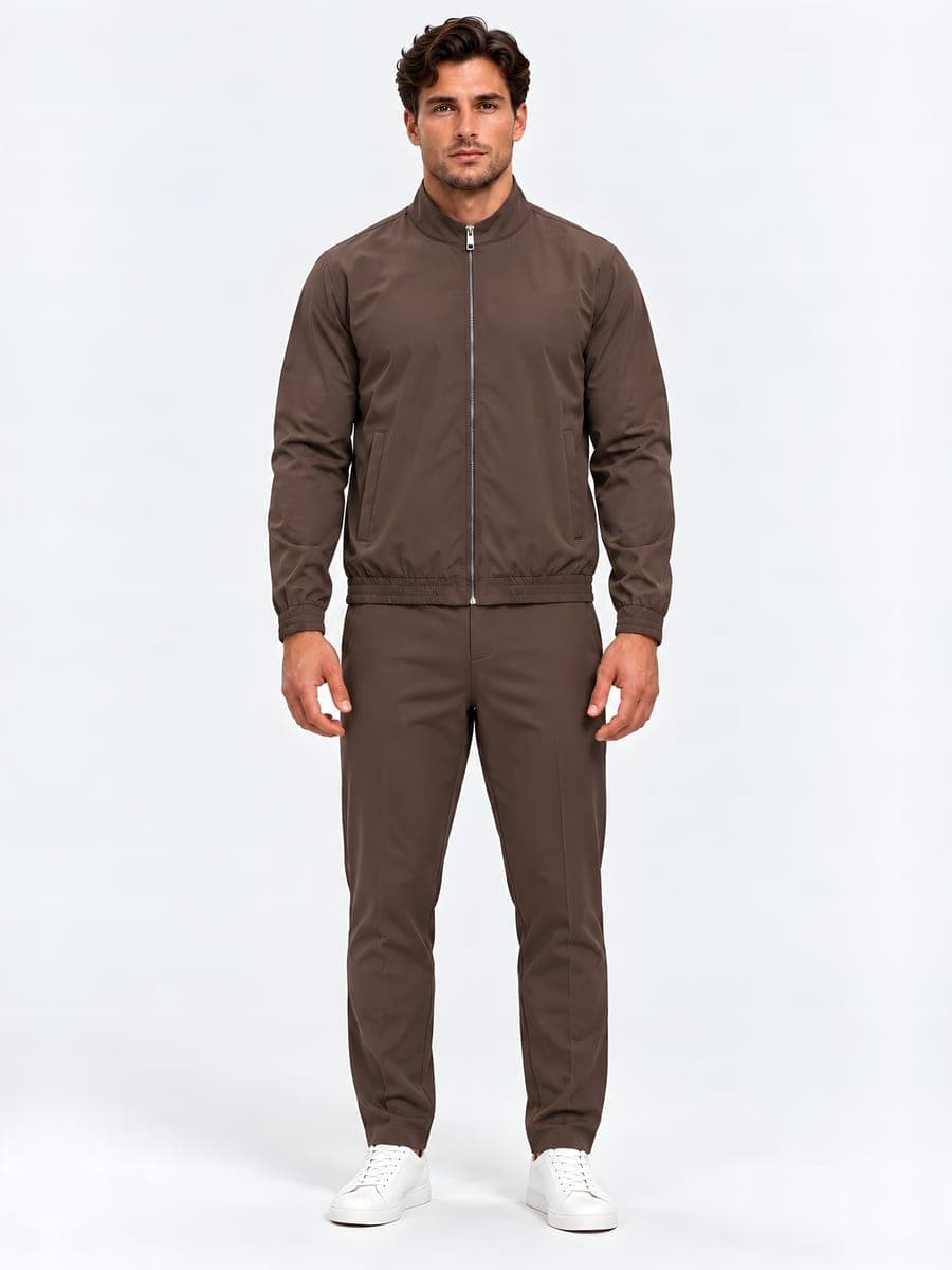 Technical set with jacket and trousers in brown, front view