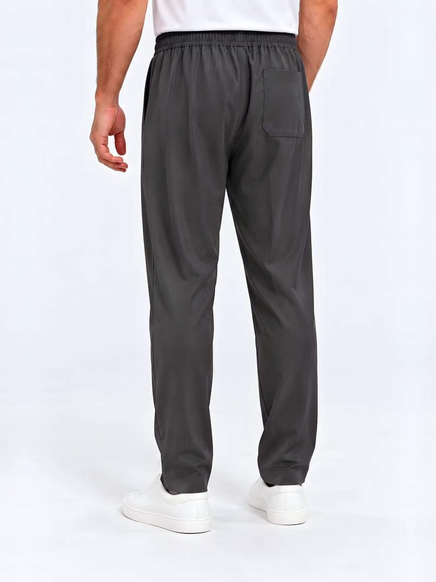 Straight leg trousers with an elastic waist in dark grey, back view