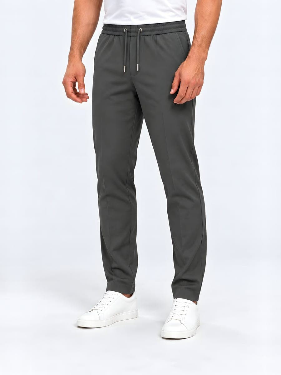 Polyester straight leg drawstring trousers in grey, angled front view