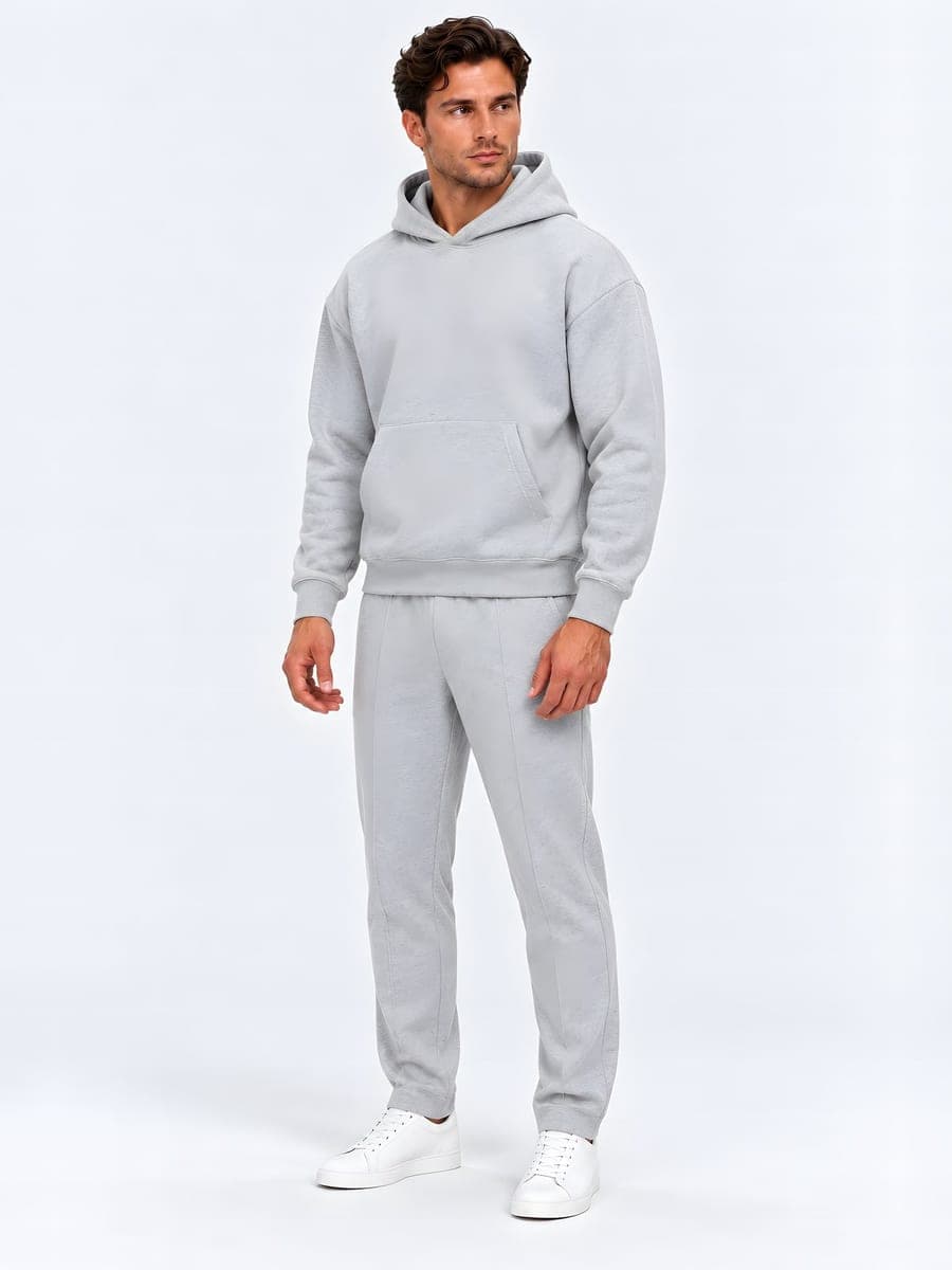 Oversized hoodie set in light grey melange, angled front view