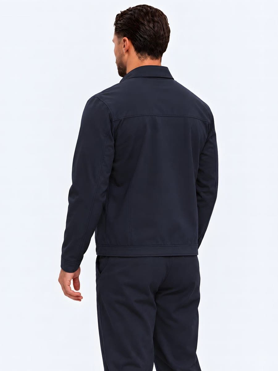 Lightly lined jacket with a lapel collar in navy, back view