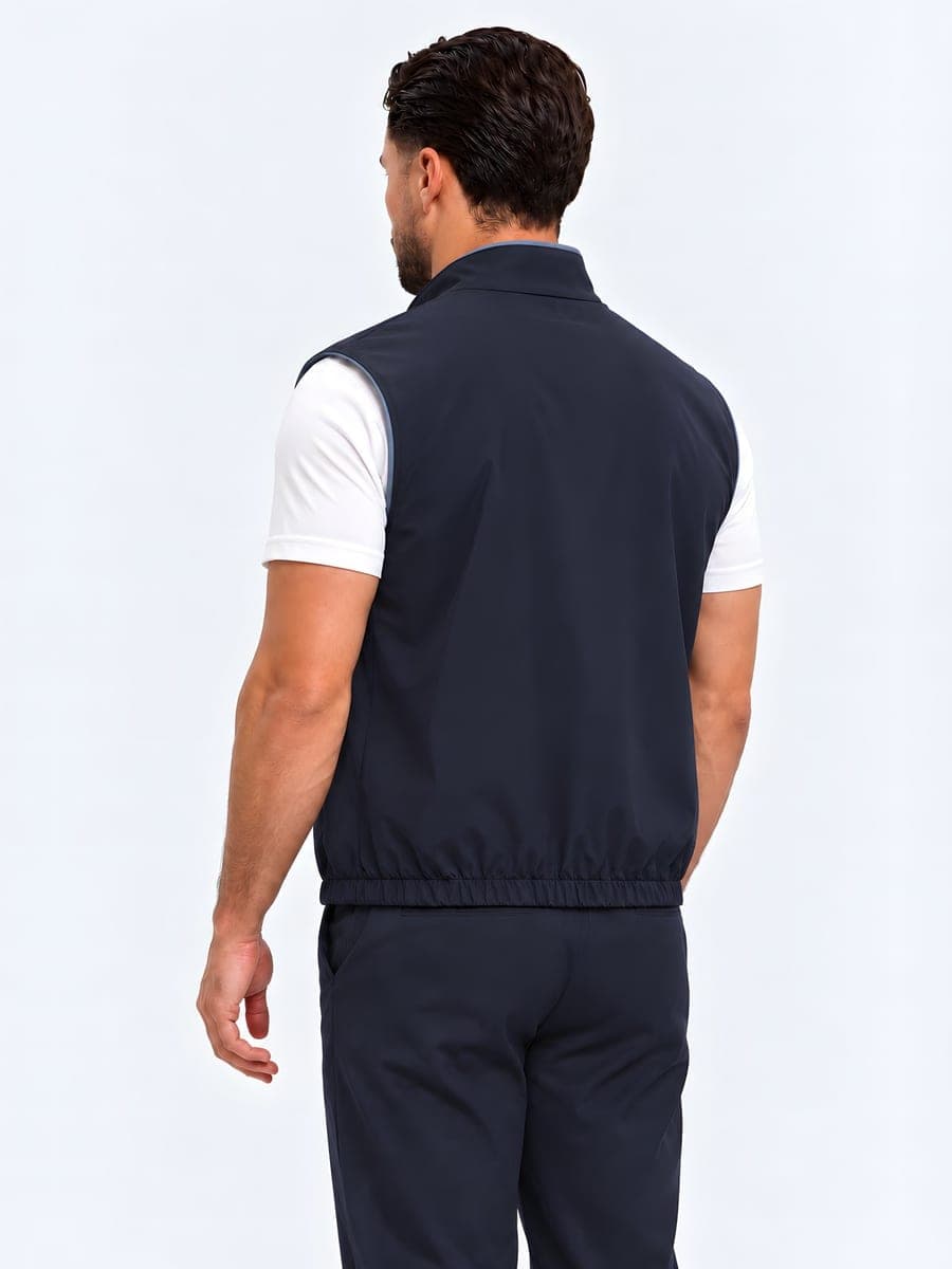 Reversible bodywarmer in navy / light blue inside, back view