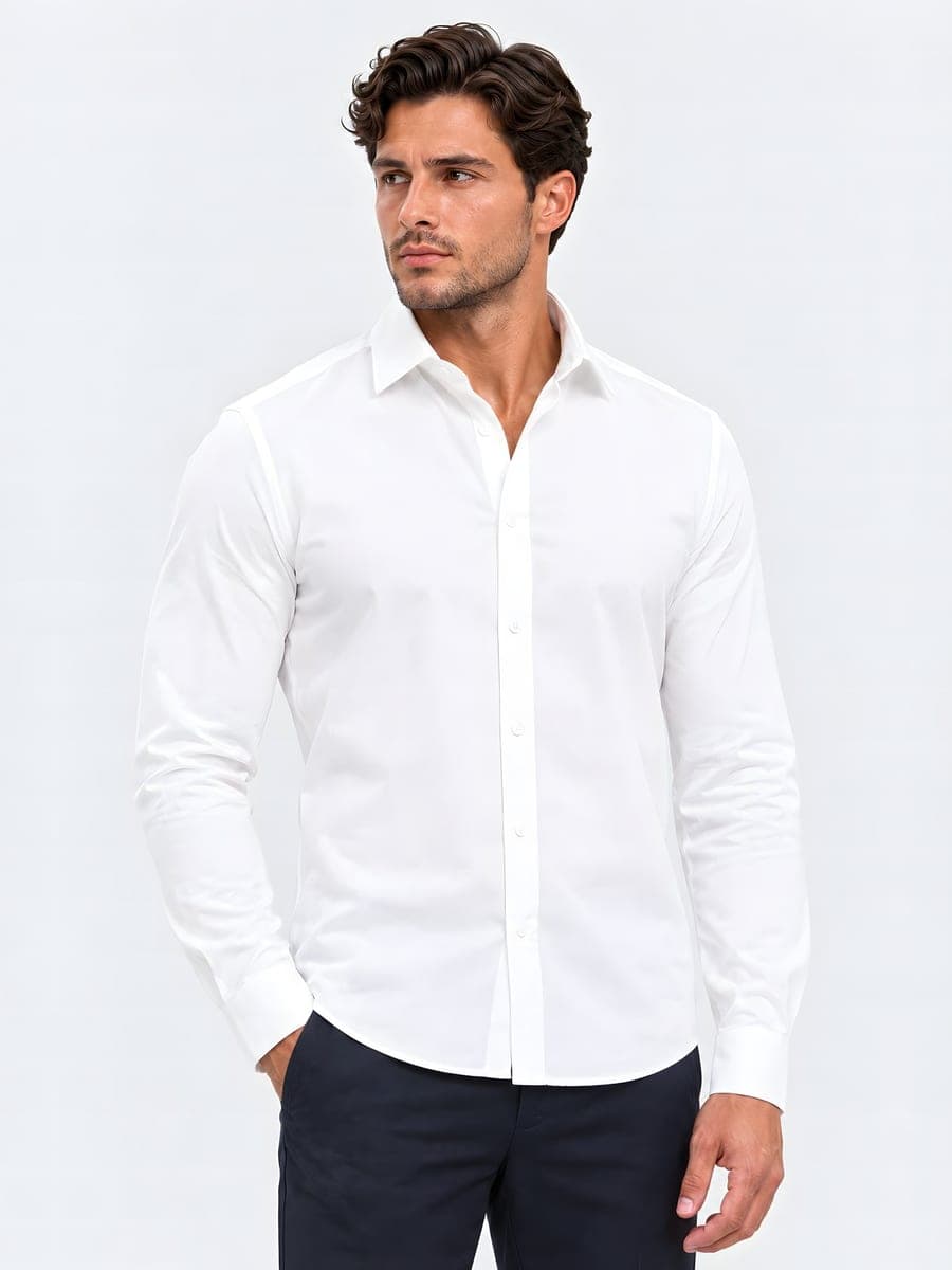 Slim fit button-down shirt in white, worn with a hand in the pocket