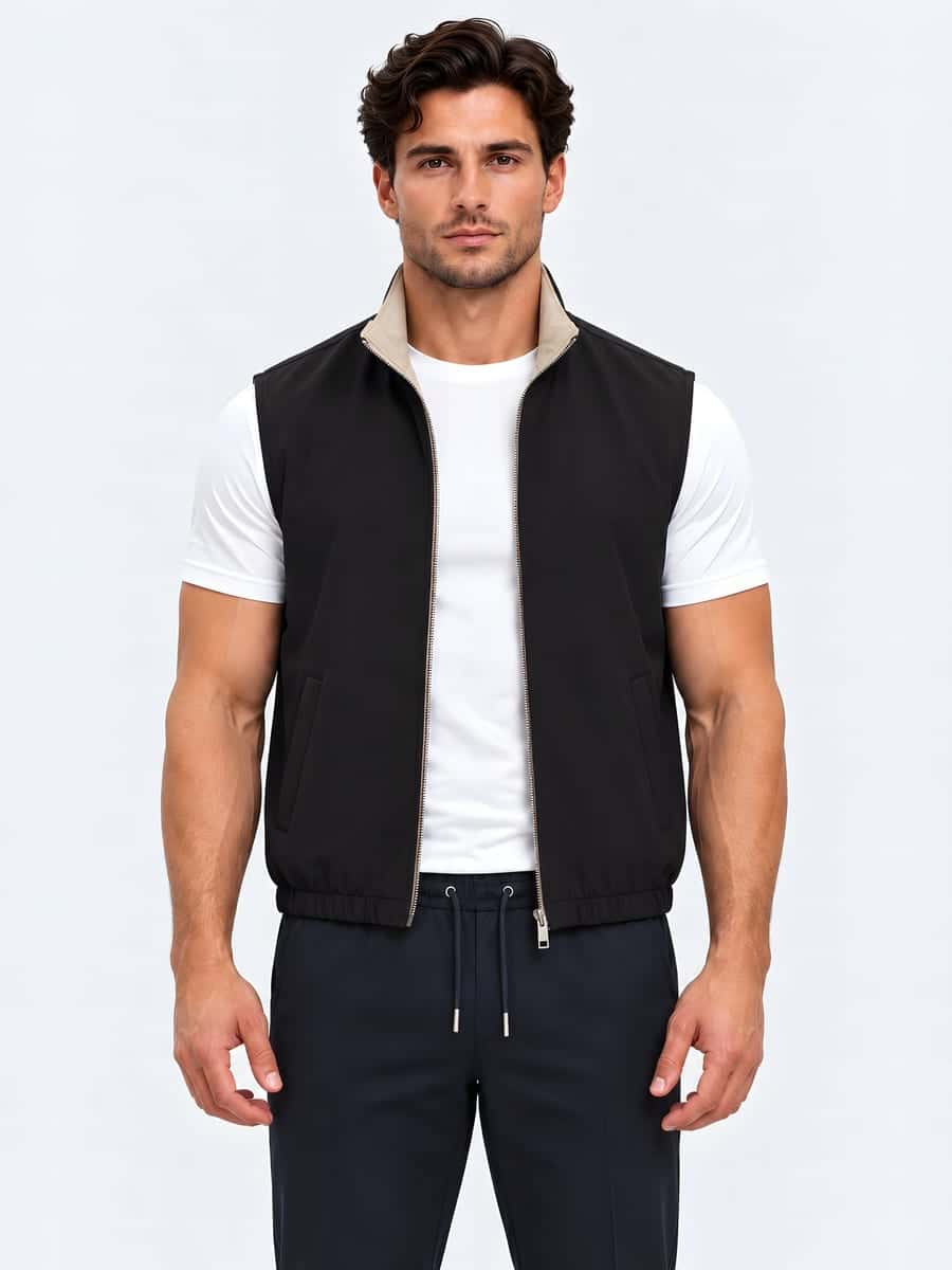 Reversible bodywarmer in black / beige inside, front view