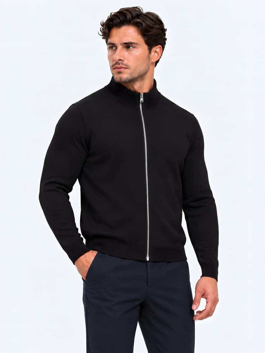 Fine knit zip cardigan with a stand collar in black, worn with a hand in the pocket
