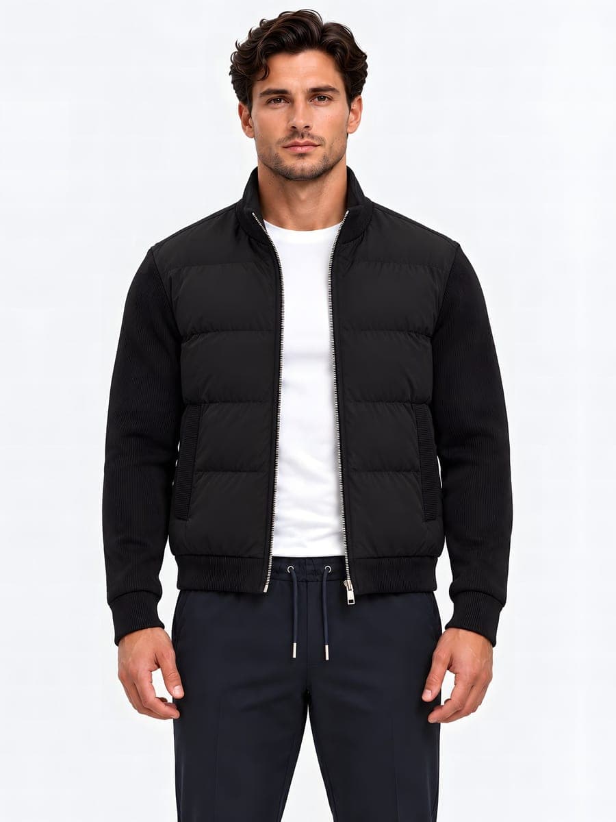 Padded jacket with knitted sleeves in black, front view