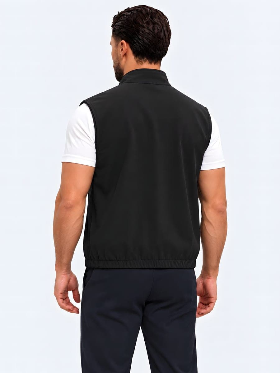 Reversible bodywarmer with a metal zip in black / sand, back view
