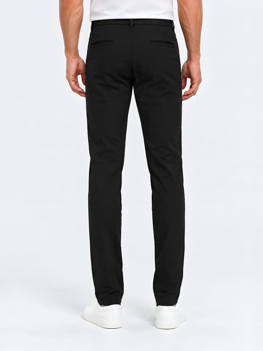 Light trousers with an elastic waist in black, back view