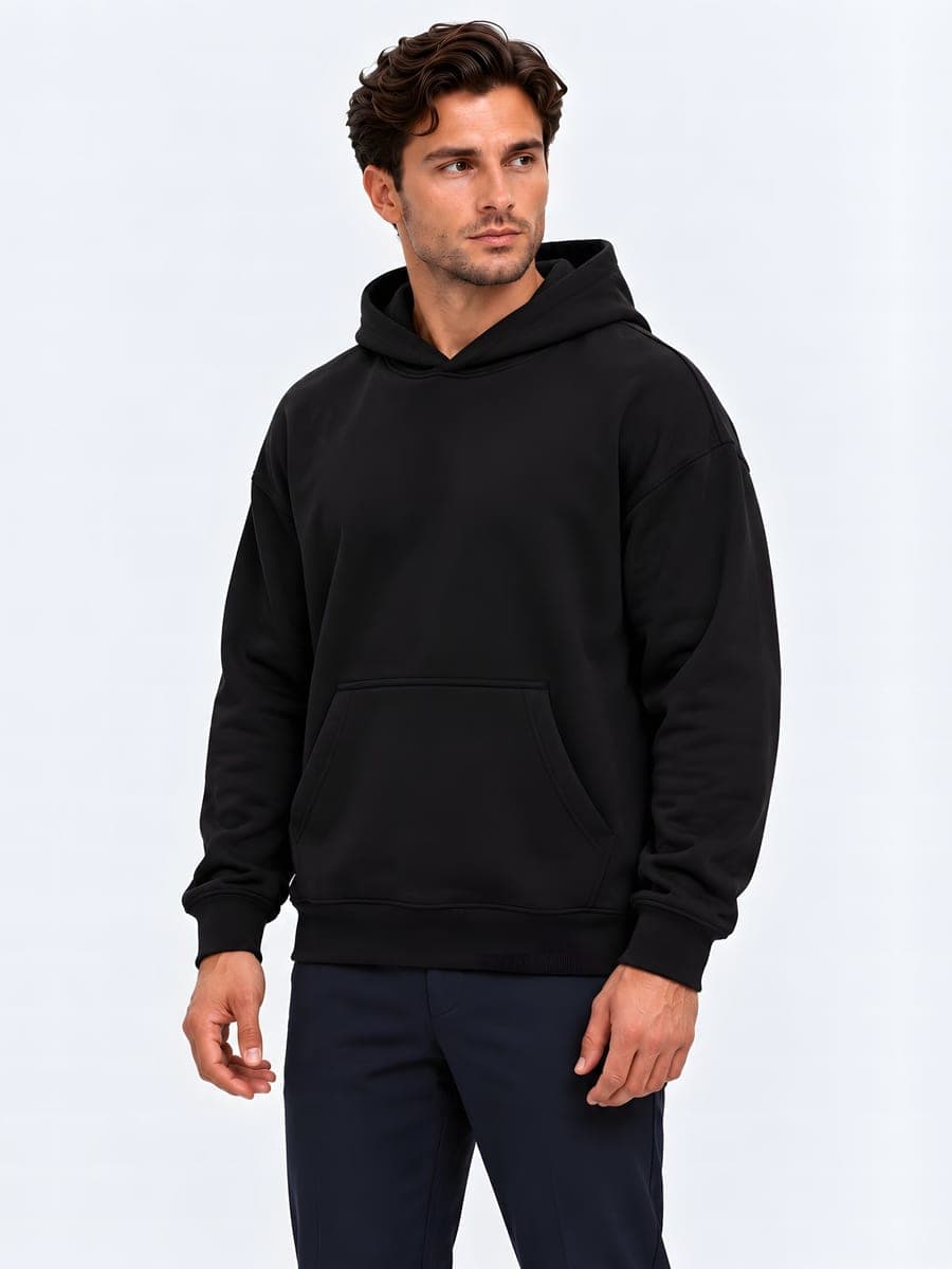 Heavyweight oversized hoodie in black, angled front view