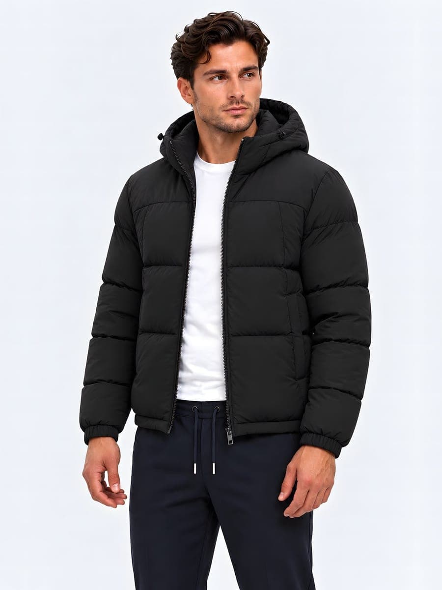 Puffer jacket with a fixed hood in black, angled front view