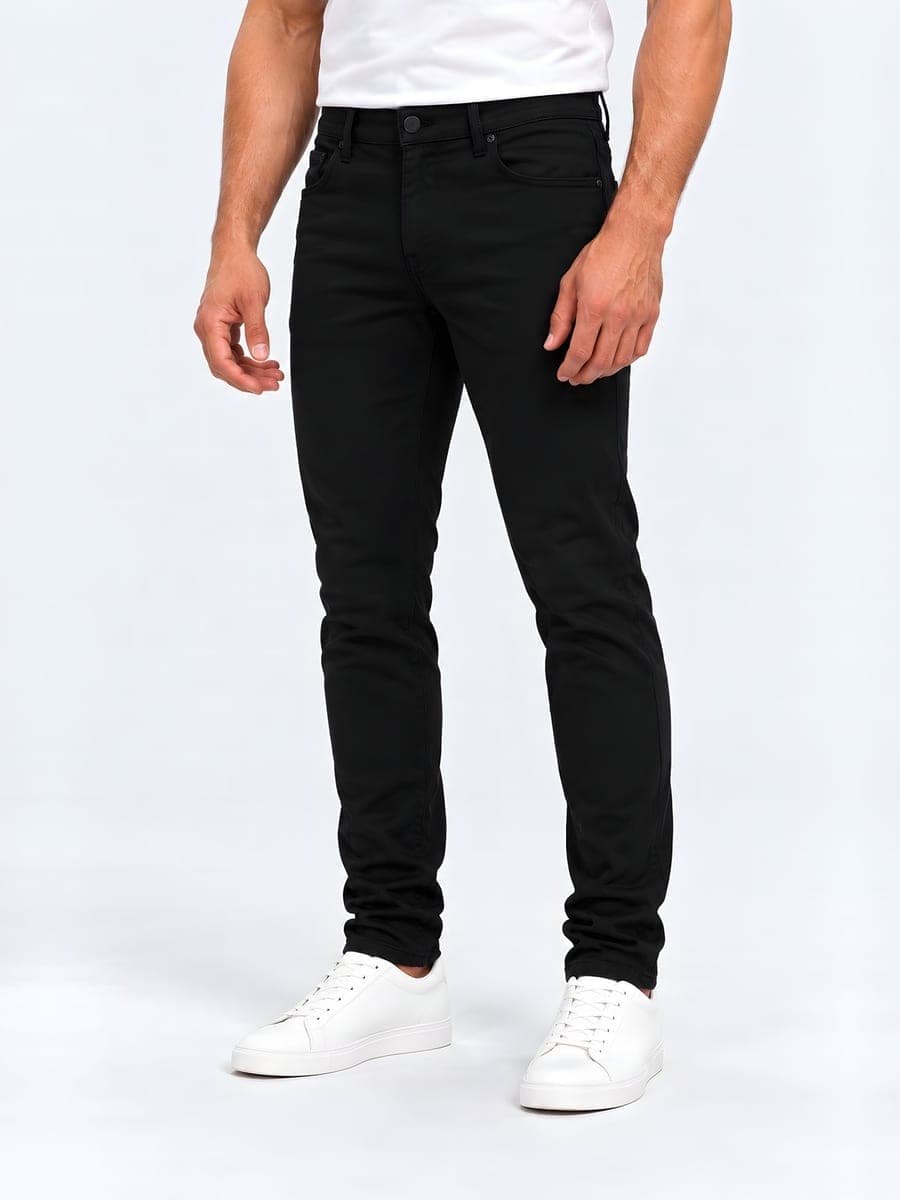 Slim fit jeans in black, angled front view