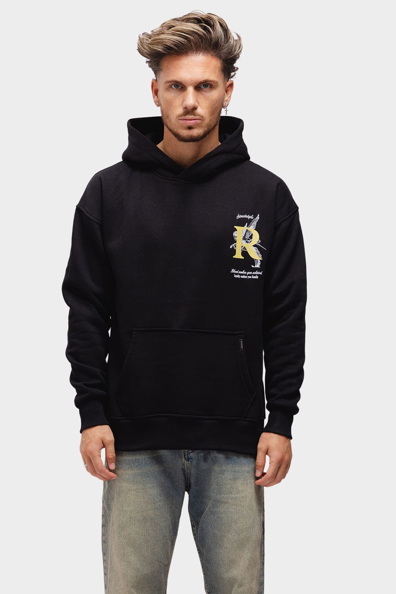 Black hoodie with a yellow R print on the front