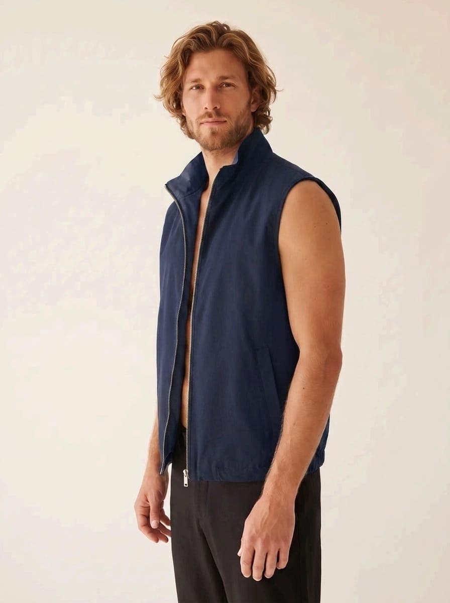 Navy bodywarmer with zip and high collar, blank article 243 from the white label stock collection